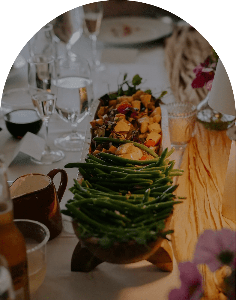 Green beans and roasted vegetables on table