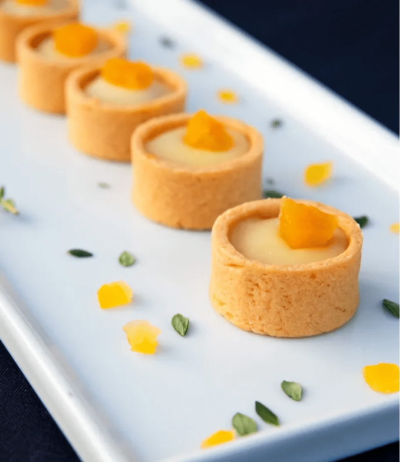 Mini tarts with fruit garnish